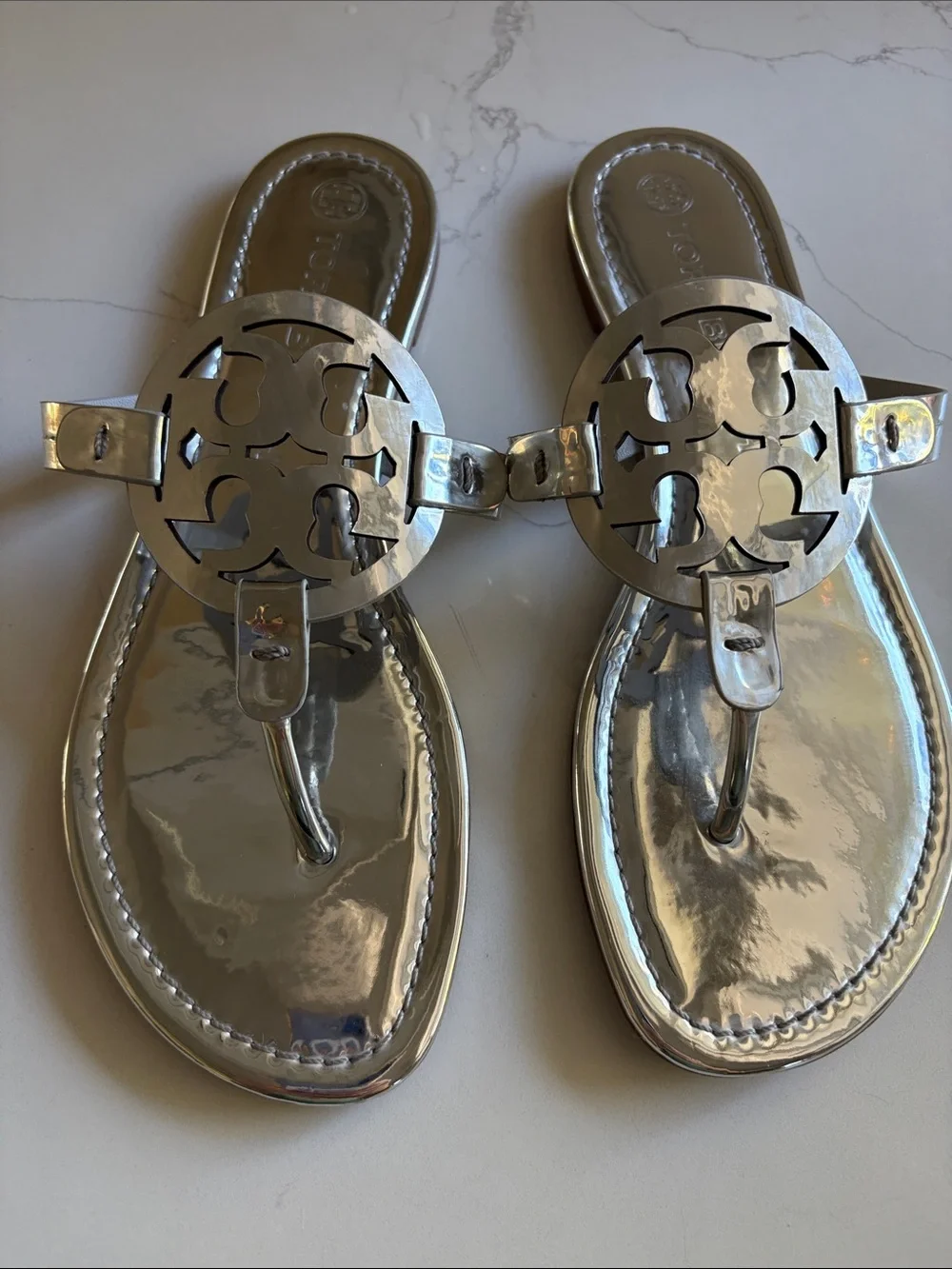Tory Burch Women’s Metallic Silver Thong Sandals with Logo Medallion size 9.5